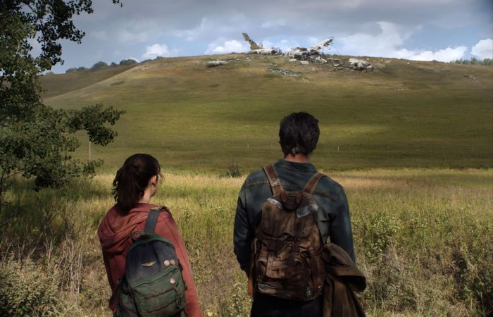 The Last of Us, a man and a girl on foot